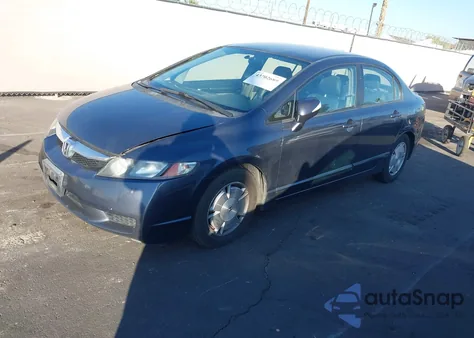 2009 Honda Civic Hybrid z USA, uszkodzony, nr VIN JHMFA362X9S008298